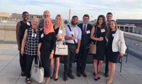 Some Political Science Alumni and student interns at the July 2018 student-alumni dinner in Washington, D.C. at Paul Hastings LLP.